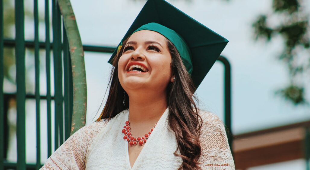 Latina graduate smiling