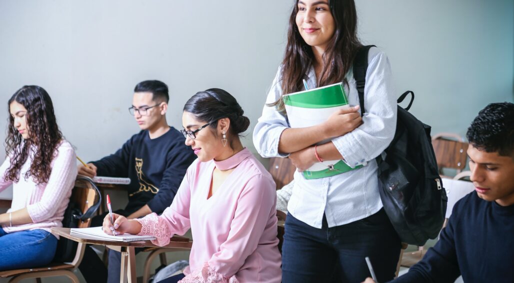 Female student standing in class