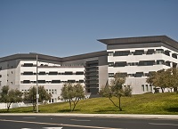 Multi-story white and black building