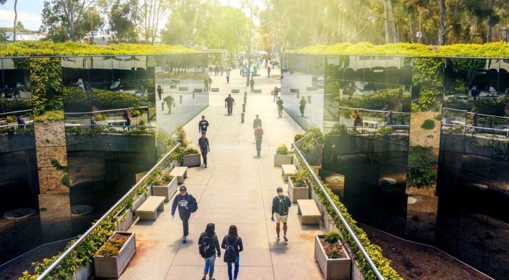 students walking across campus