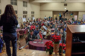 Professional speaking in front of conference attendees