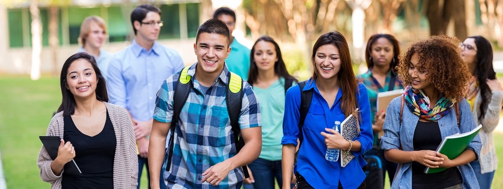 Diverse students walking on campus
