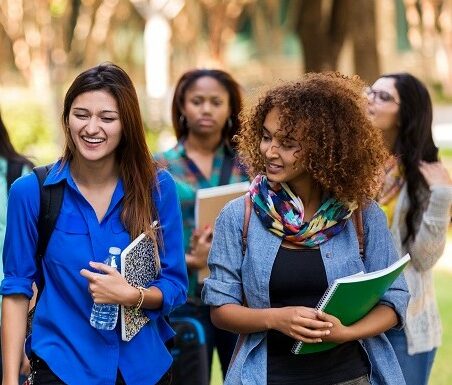 Female students walking on campus